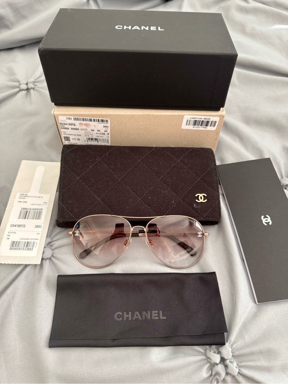 CHANEL Aviator Sunglasses - Rose Gold Frame with Brown Gradient Lenses.